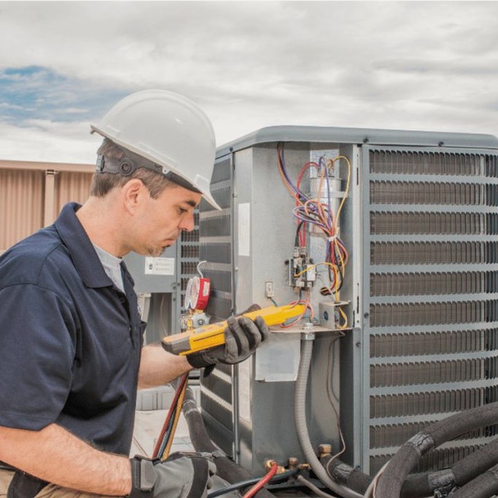 Exeter Duct Cleaning certified duct cleaning technician on a service call in Exeter, Ontario